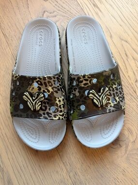 CROCS Disney Leopard & Camo Slide Sandals in Green, Brown & White